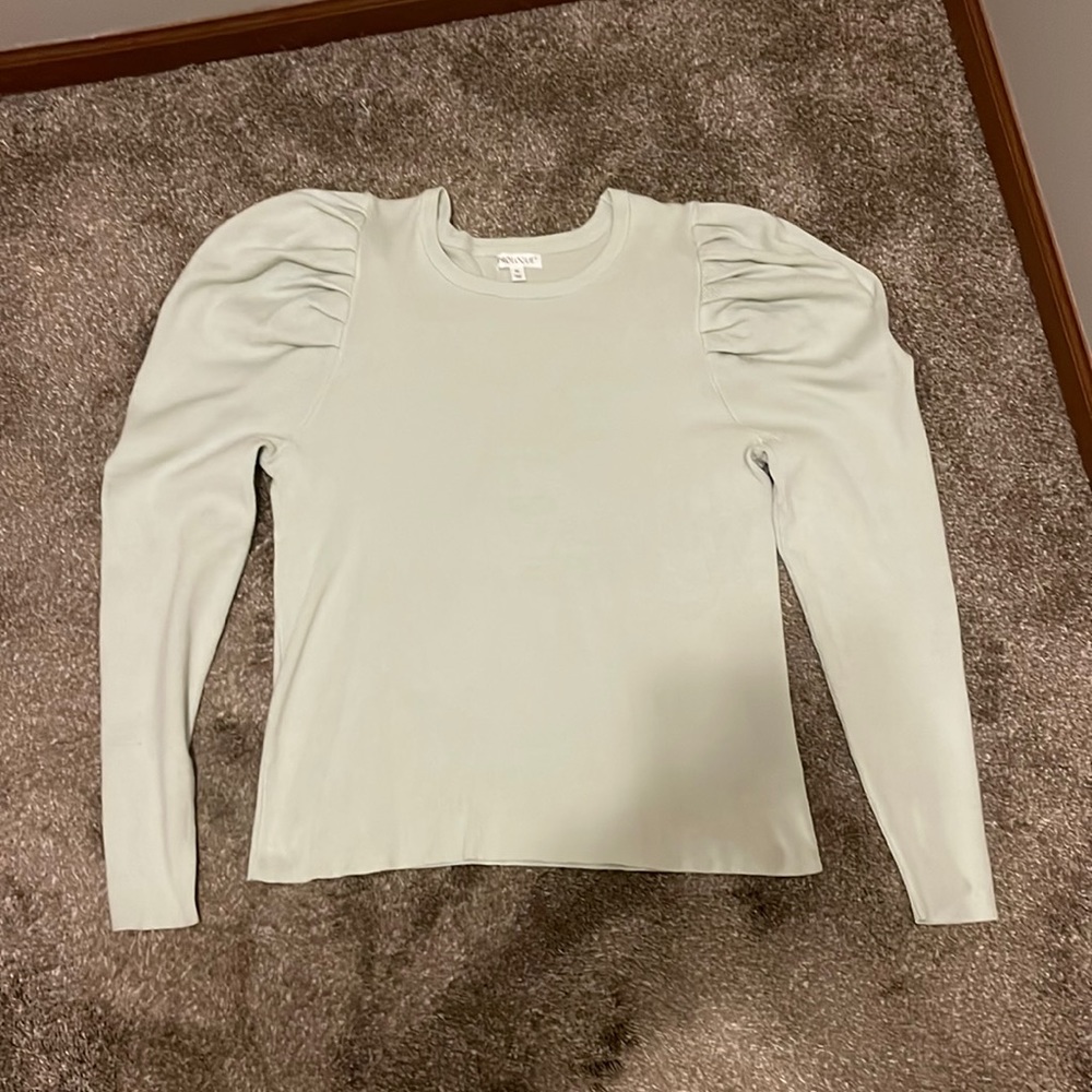 Ruffle sleeve light weight sweater. Prologue light green flattering top.